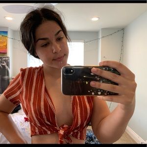 tied crop top ( also worn with a top under )